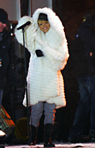 Rihanna in huge white fur coat