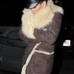 Rihanna in shearling coat and village people hat Rihanna in shearling coat and village people hat