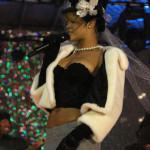 Rihanna white fur and top hat rockefeller center Rihanna white fur and top hat rockefeller center